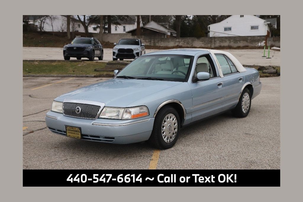 Light Ice Blue 2004 Mercury Grand Marquis GS Sedan Rear-Wheel Drive 4-Speed Automatic Overdrive