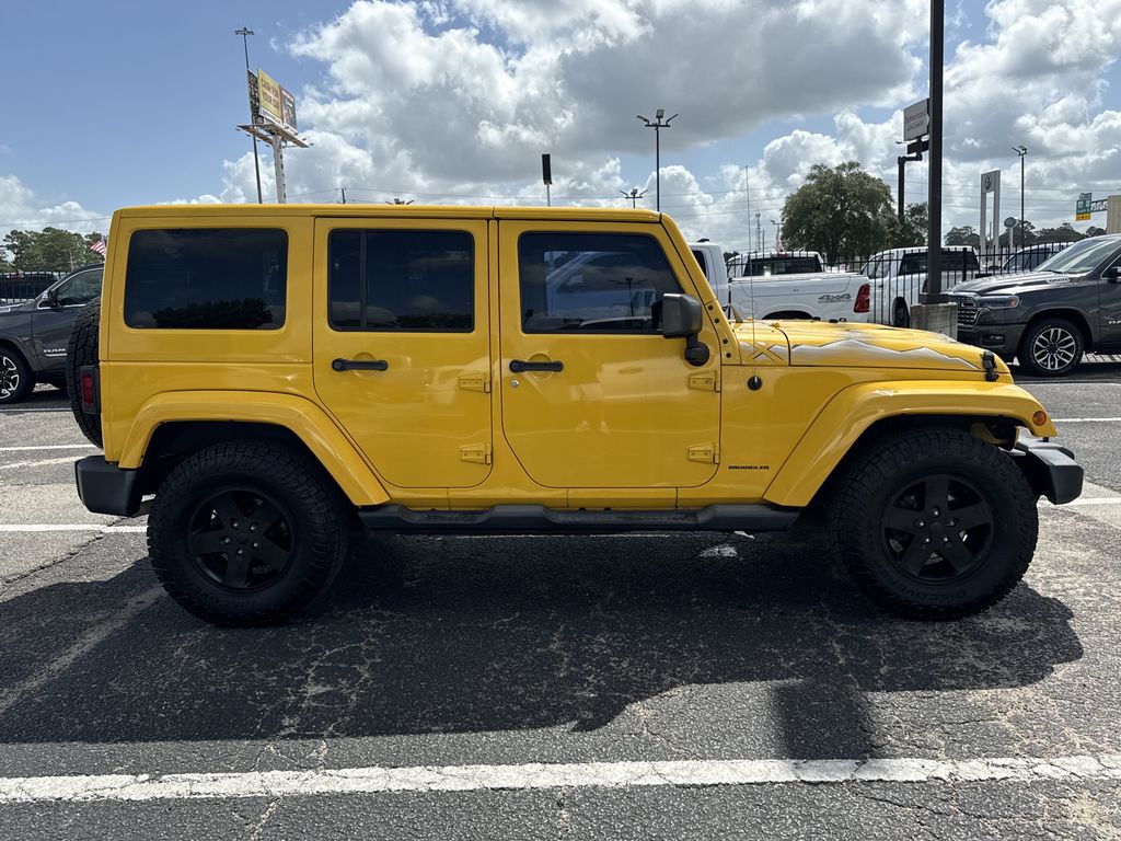 2015 Jeep Wrangler Unlimited Sahara Yellow at Parkway Family Mazda