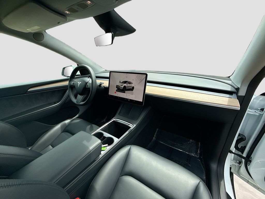 2024 Tesla Model Y Long Range White at AutoSavvy Houston Southwest