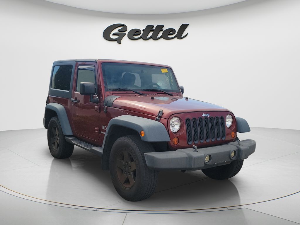Used 2009 Red Jeep X image 4