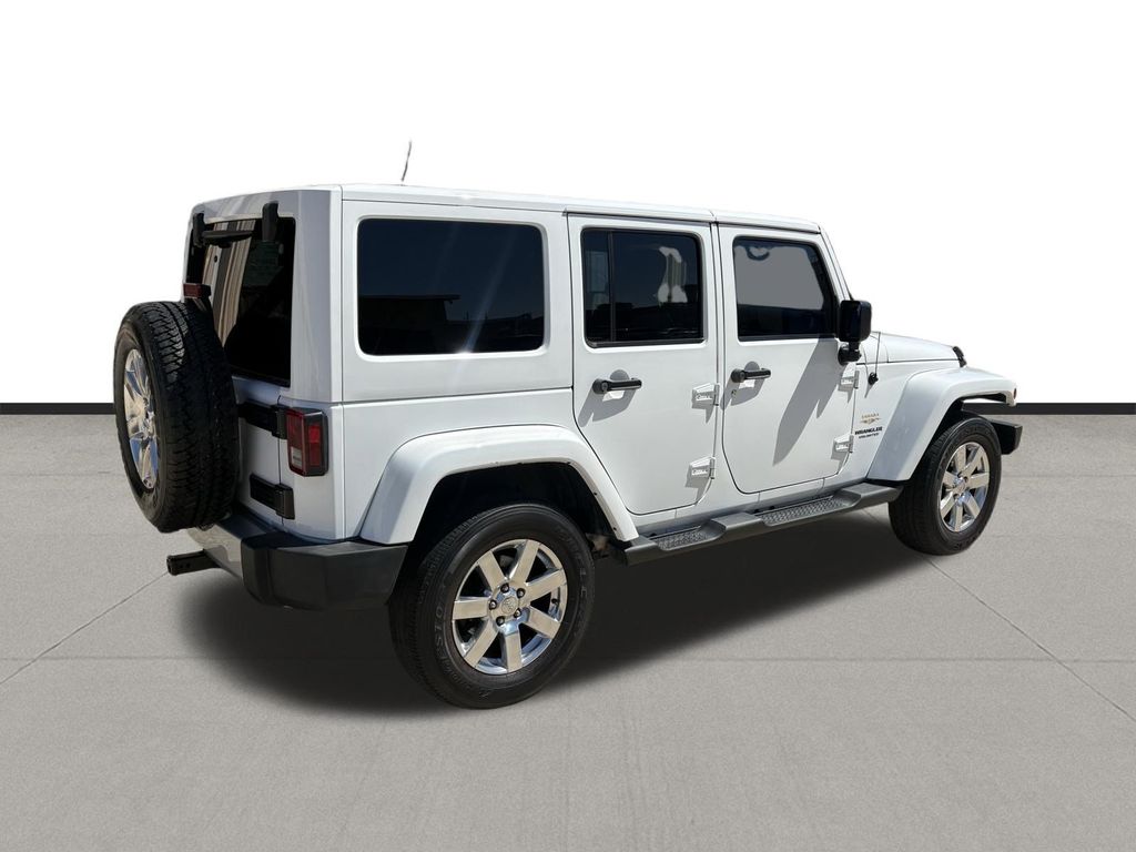 2014 Jeep Wrangler Unlimited Sahara White at Autostrade