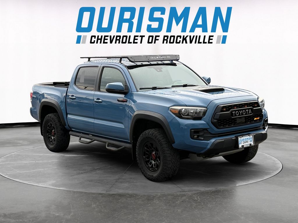 Blue 2018 Toyota Tacoma Pickup Truck Four-Wheel Drive 6-Speed Automatic