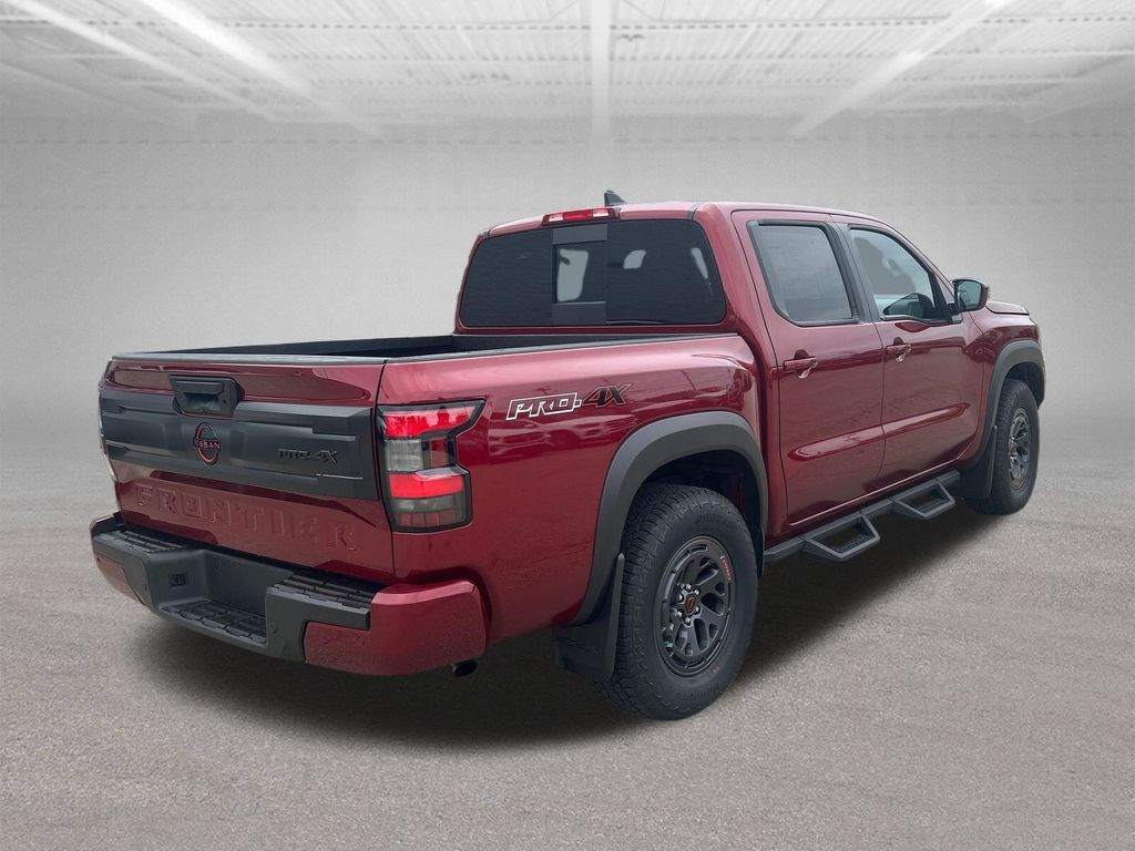 2025 Nissan Frontier PRO-4X Red at South Hills Kia