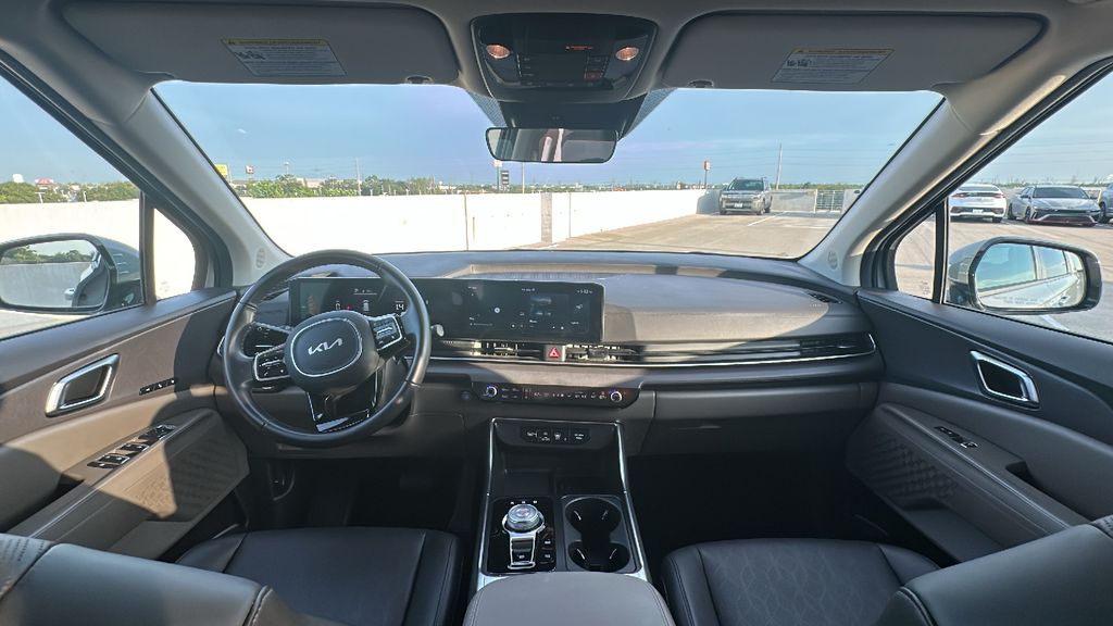 2026 Kia Carnival Hybrid EX White at Shottenkirk Kia Fort Bend