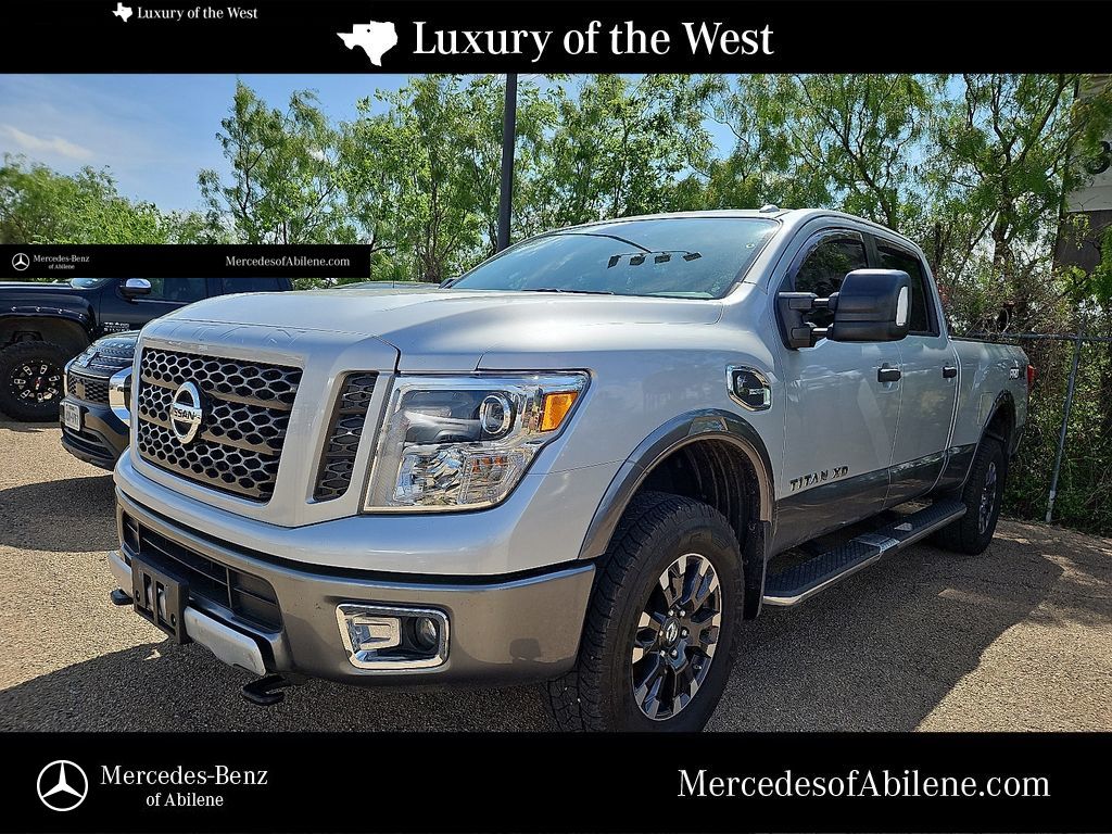 Brilliant Silver 2018 Nissan Titan XD PRO-4X Crew Cab 4WD Pickup Truck Four-Wheel Drive 6-Speed Automatic