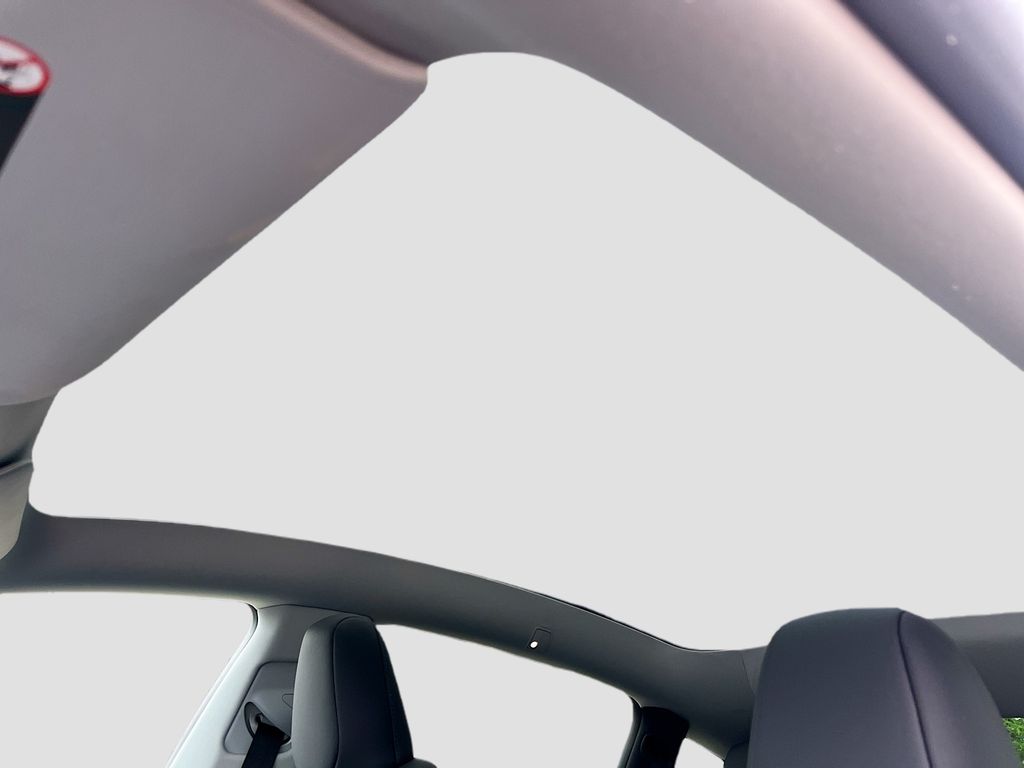 2026 Tesla Model Y Long Range White at AutoSavvy Houston Northwest