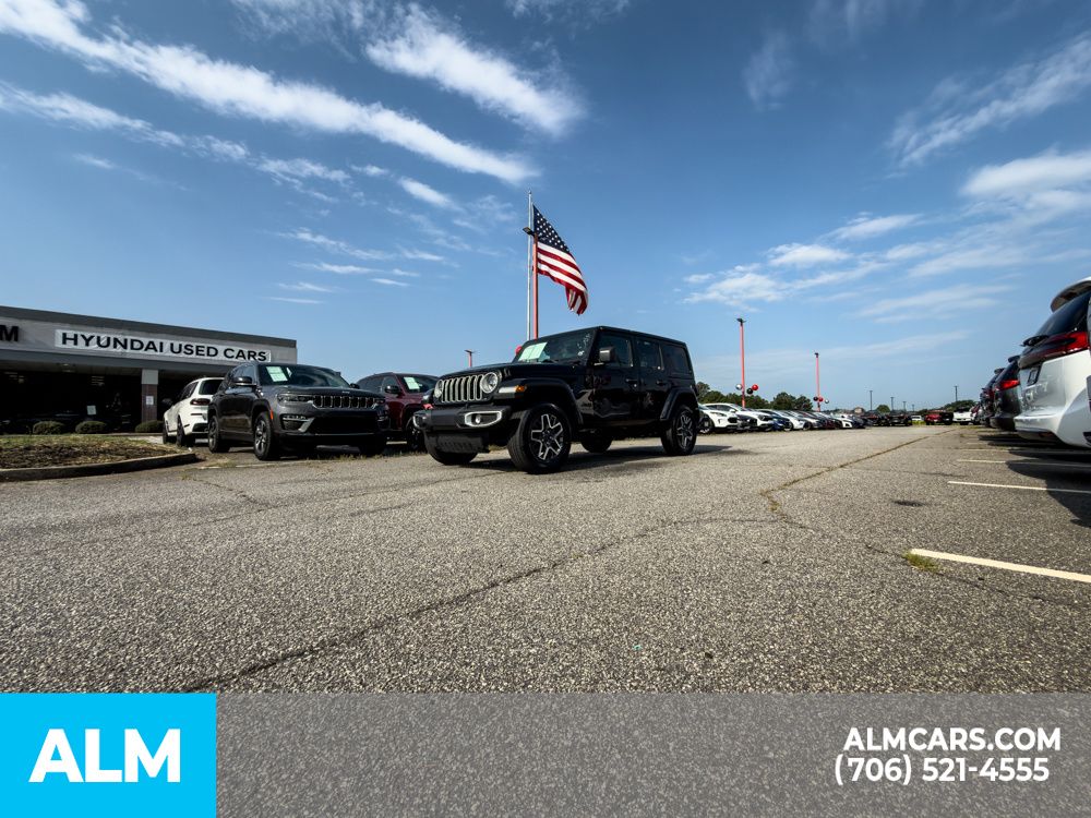 Used 2025 Black Jeep Sahara image 6