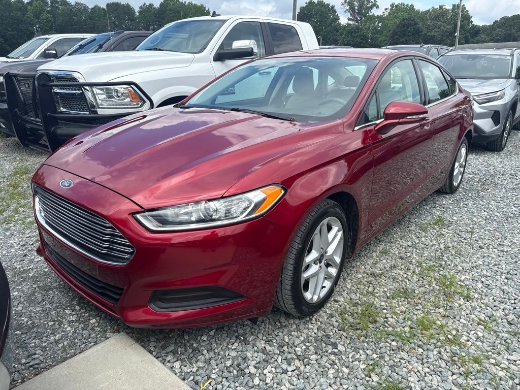 Ruby Red Metallic 2014 Ford Fusion Sedan Front-Wheel Drive 6-Speed Automatic