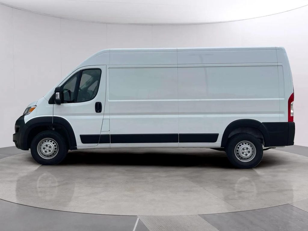 Used 2025 Bright White Clearcoat Ram High Roof image 2