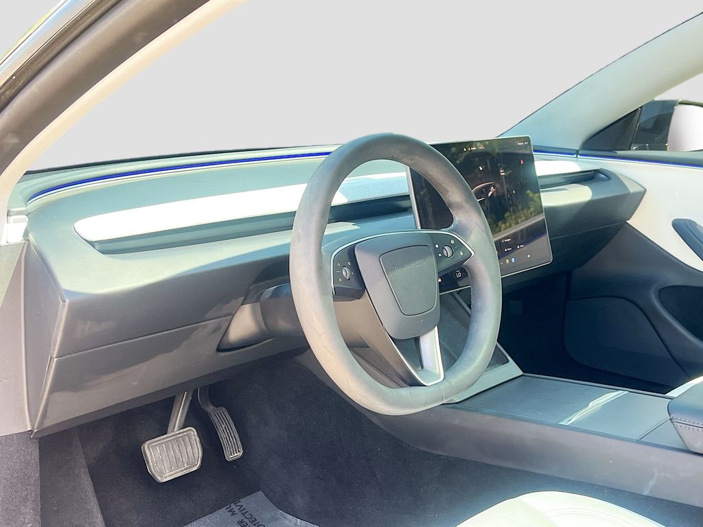 2025 Tesla Model 3 Long Range Black at AutoSavvy Houston Northwest