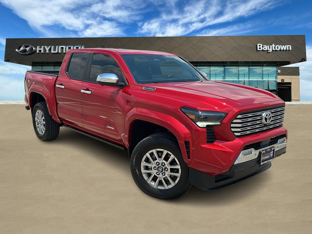 2026 Toyota Tacoma Hybrid Limited Red at EAG Ford Navasota