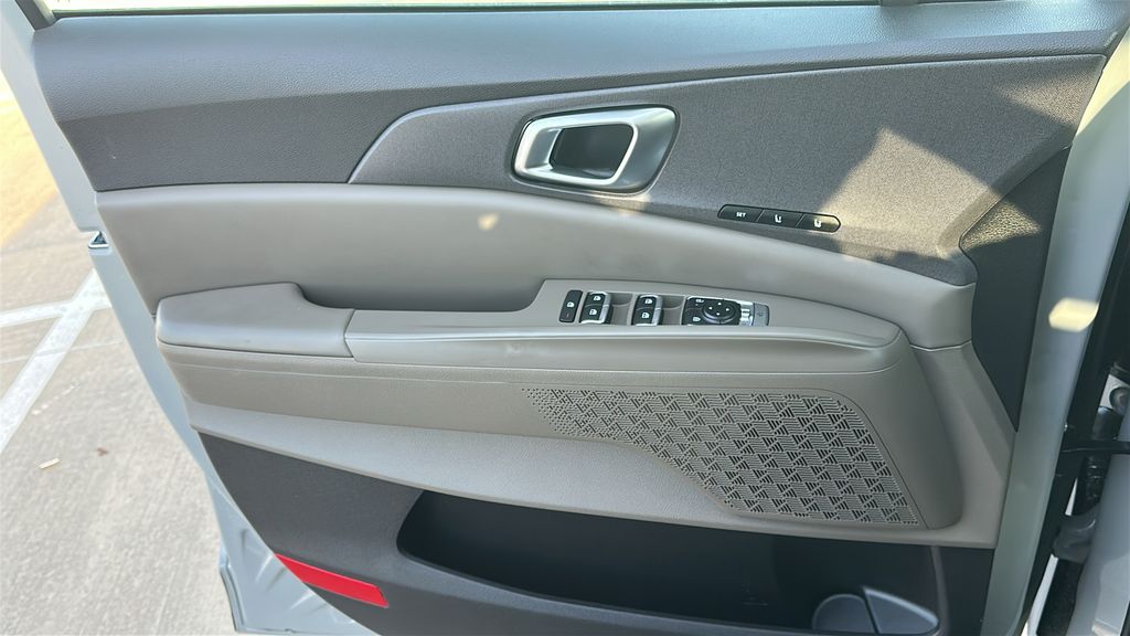 2026 Kia Carnival Hybrid EX White at Shottenkirk Kia Fort Bend