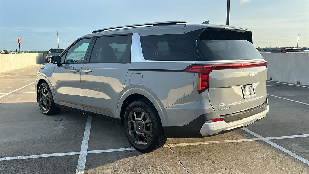 2026 Kia Carnival Hybrid EX White at Shottenkirk Kia Fort Bend