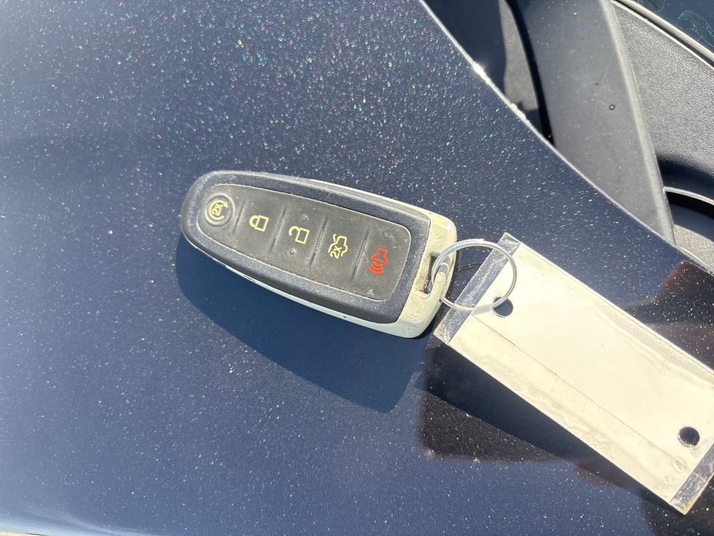 2014 Tuxedo Black Metallic Ford Focus Titanium FWD Hatchback