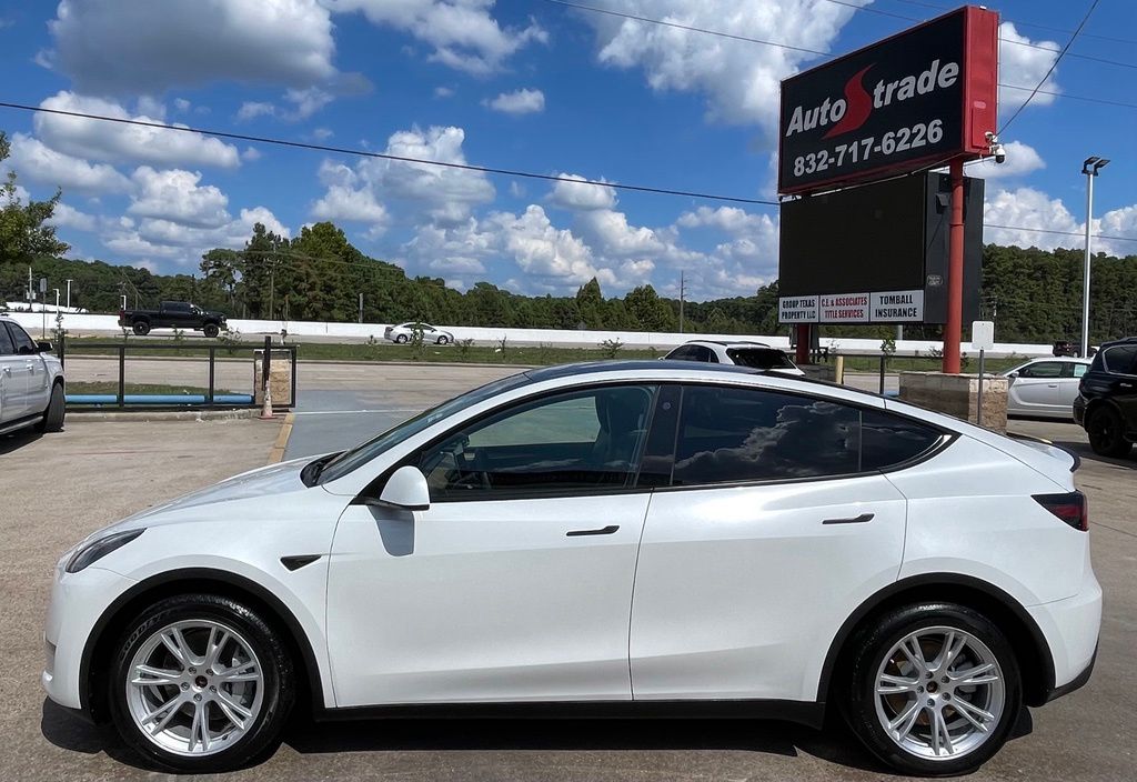 2023 Tesla Model Y Long Range White at River Oaks CDJR