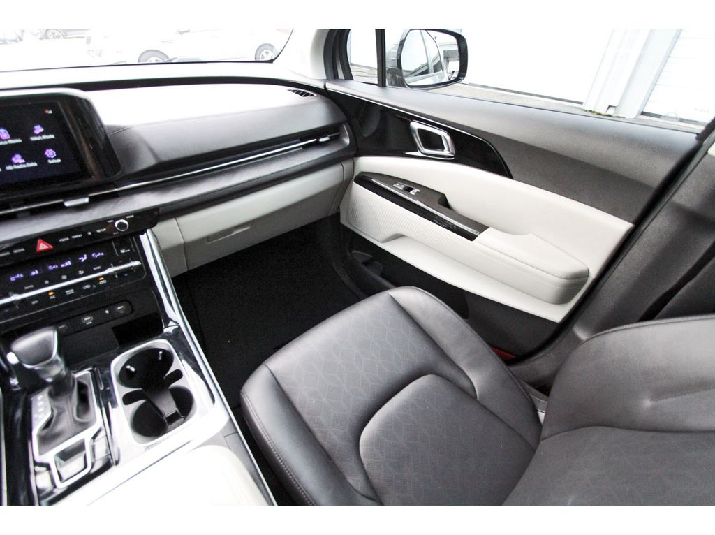 2024 Kia Carnival EX White at Classic Chevrolet Galveston