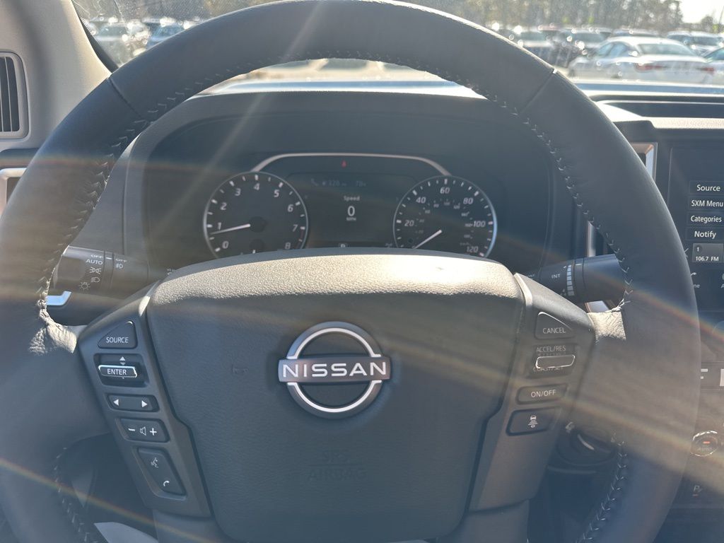 2025 Glacier White Nissan Frontier SV 4X4 Truck