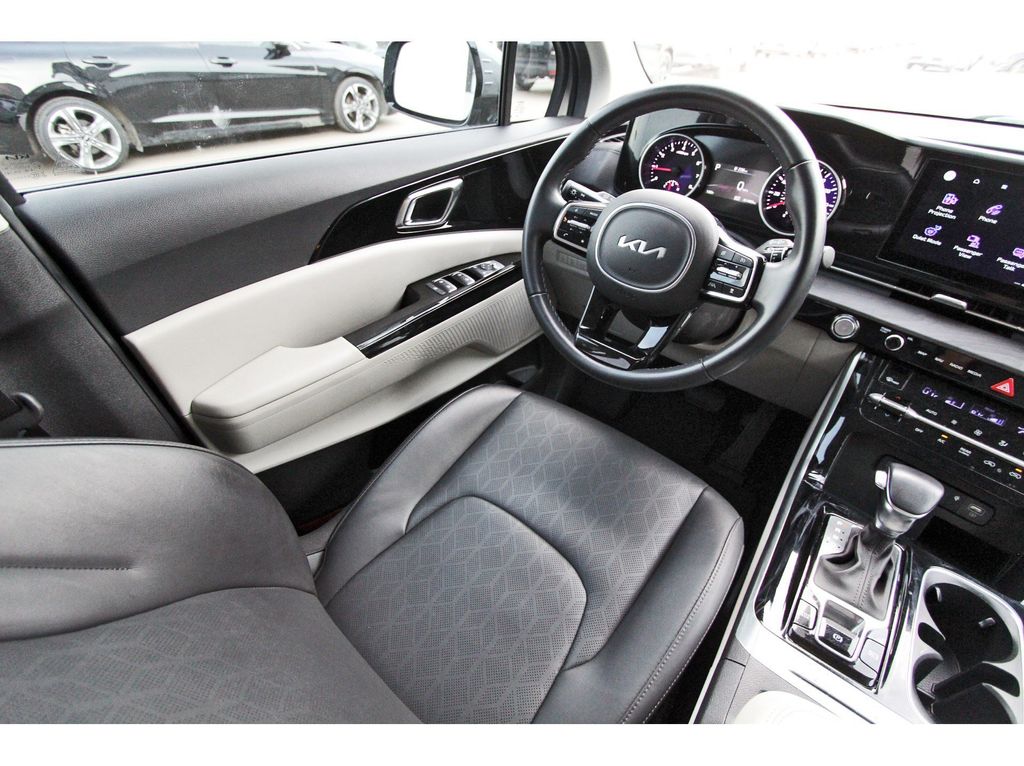 2024 Kia Carnival EX White at Classic Chevrolet Galveston