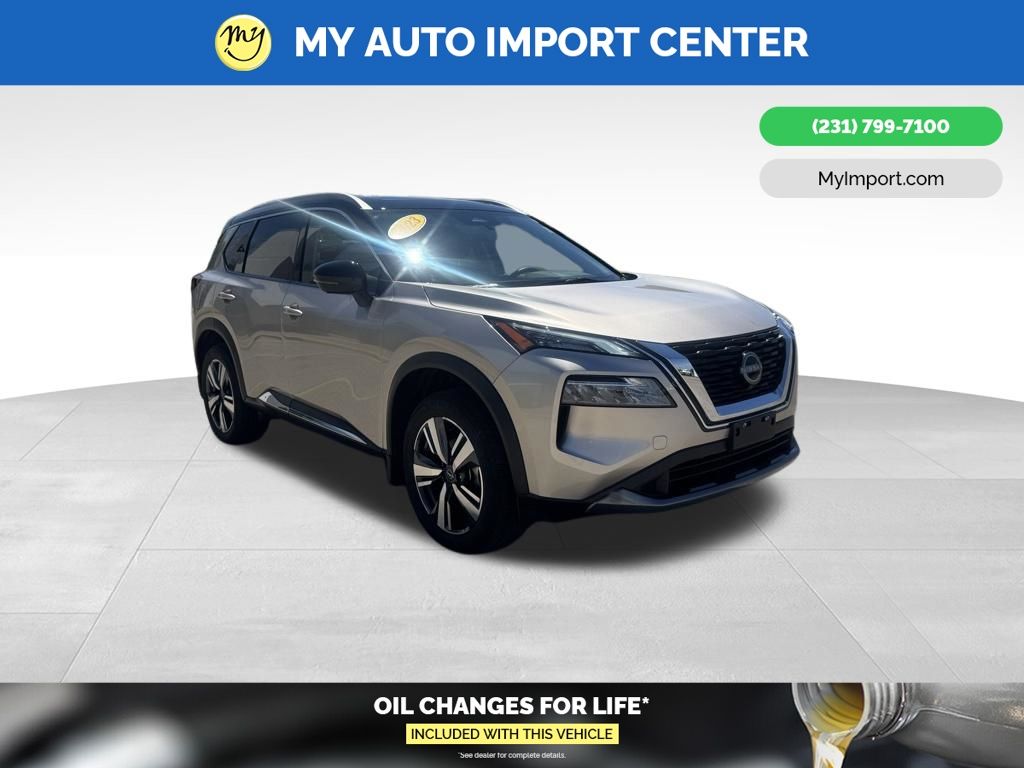 Champagne Silver Metallic/Super Black 2023 Nissan Rogue SL AWD SUV / Crossover All-Wheel Drive Continuously Variable Transmission