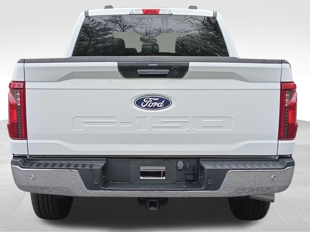 View vehicle photo 4