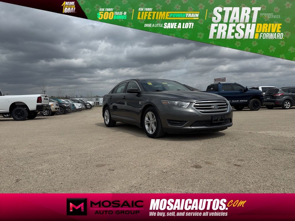 Gray (Magnetic Metallic) 2015 Ford Taurus SEL Sedan Front-Wheel Drive 6-Speed Automatic