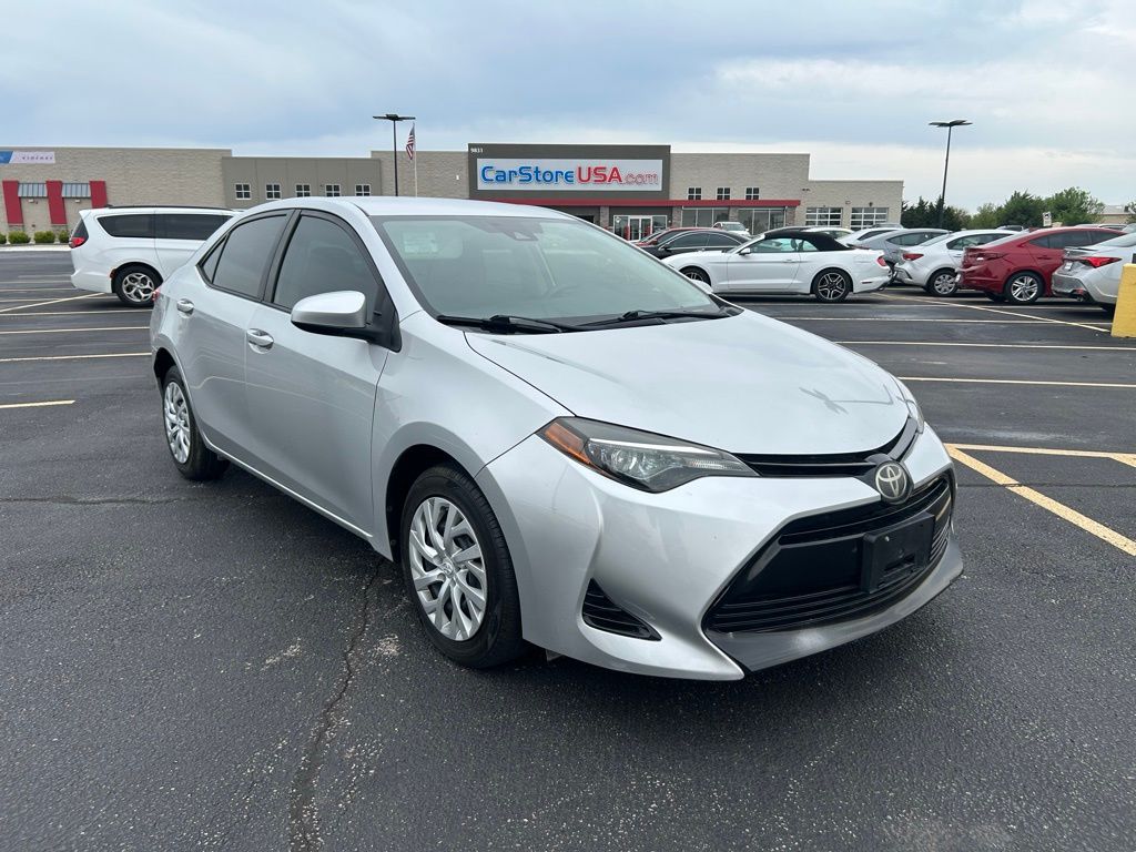 Classic Silver Metallic 2018 Toyota Corolla LE Sedan Front-Wheel Drive Continuously Variable Transmission