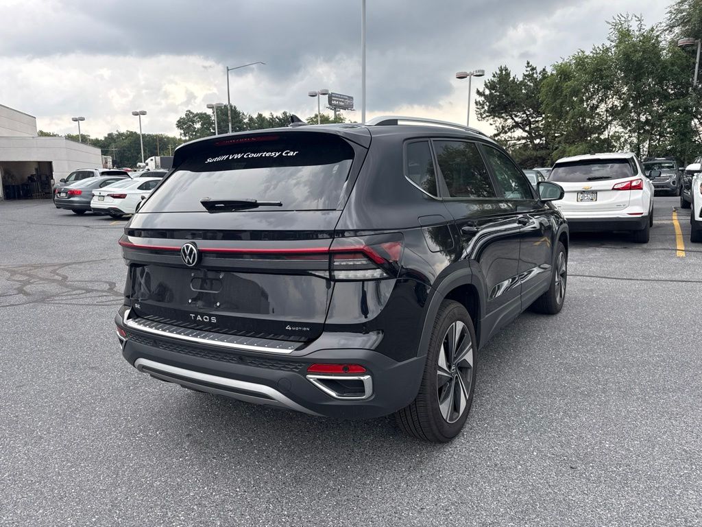 2025 Volkswagen Taos 1.5T SE Black at Sutliff Volkswagen