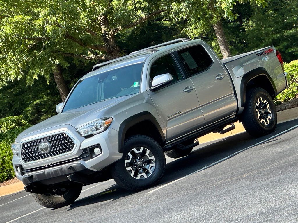 Silver Sky Metallic 2019 Toyota Tacoma Pickup Truck Four-Wheel Drive 6-Speed Manual