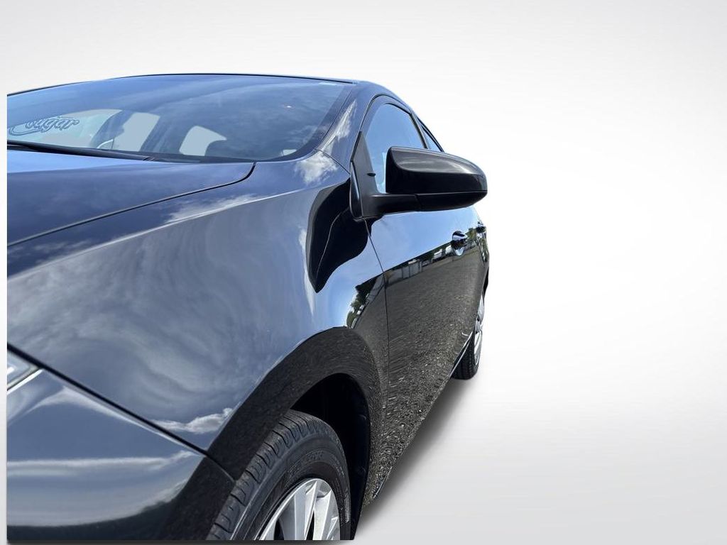 2016 Black Sand Pearl Toyota Corolla LE FWD Sedan