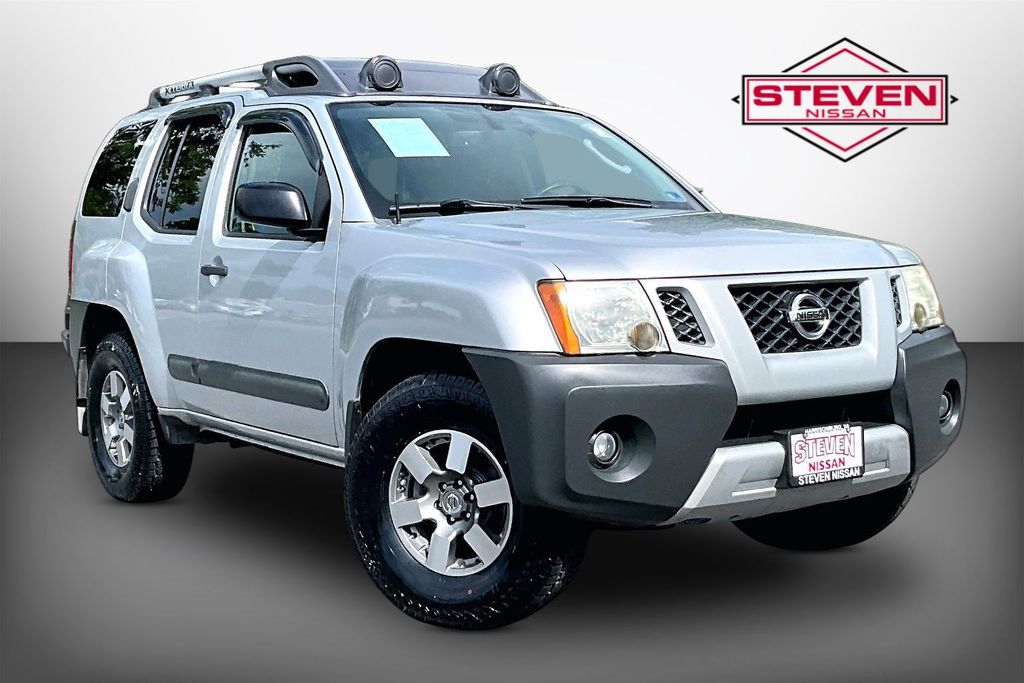 Silver Lightning Metallic 2011 Nissan Xterra SUV / Crossover 5-Speed Automatic
