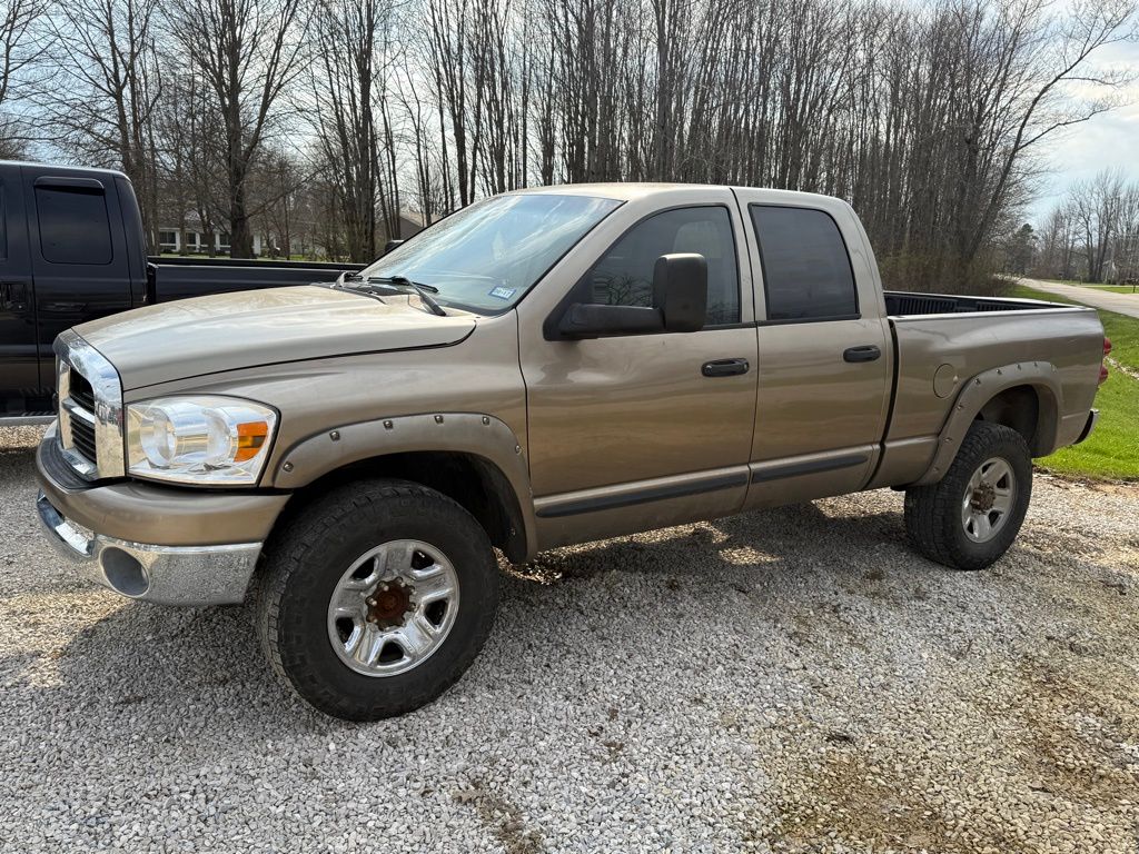 Brown (Light Khaki Metallic Clearcoat) 2007 Dodge RAM 2500 SLT Quad Cab 4WD Pickup Truck Four-Wheel Drive 4-Speed Automatic