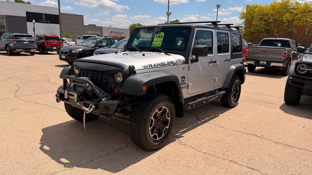 Bright Silver Metallic Clearcoat 2011 Jeep Wrangler Unlimited Sport 4WD SUV / Crossover Four-Wheel Drive 4-Speed Automatic
