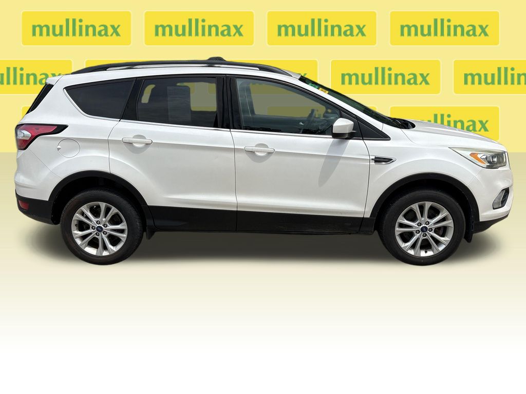 Used 2017 Ford Escape SE with VIN 1FMCU9G96HUC83319 for sale in New Smyrna Beach, FL