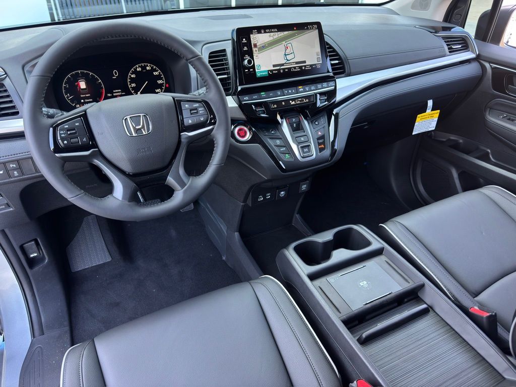 2026 Honda Odyssey Touring Silver at AutoSavvy Houston Southwest