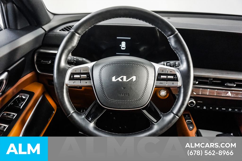 Used 2025 Black Kia EX X-Line image 25