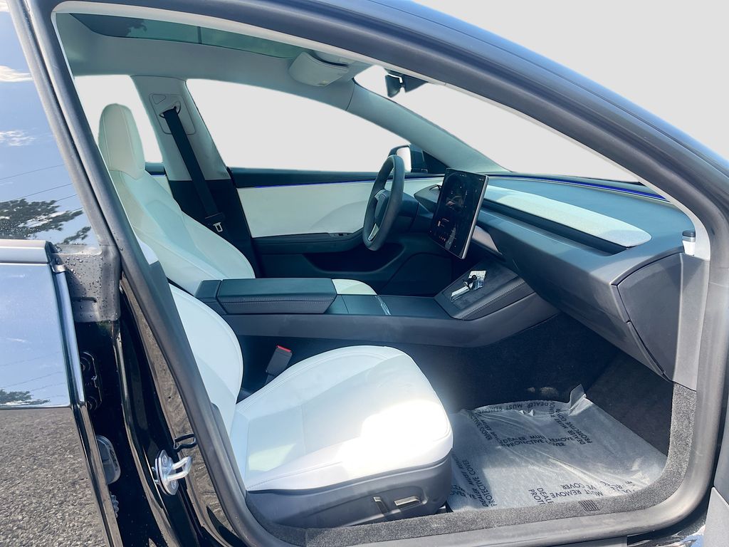 2025 Tesla Model 3 Long Range Black at AutoSavvy Houston Northwest