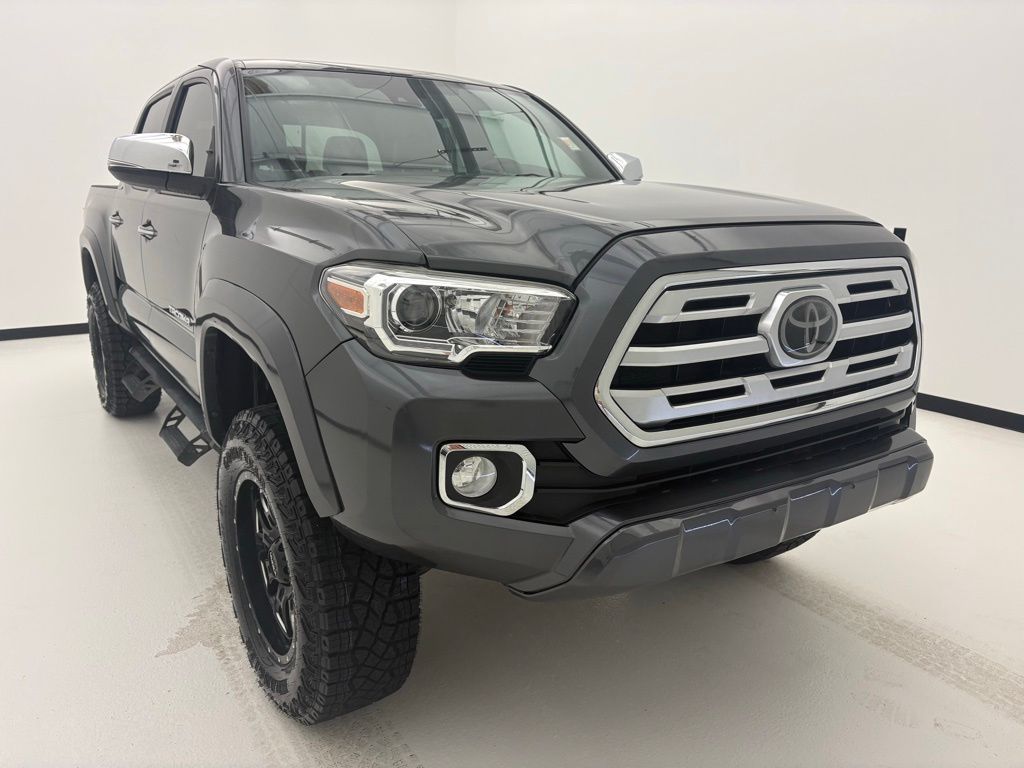 Midnight Black Metallic 2018 Toyota Tacoma Pickup Truck Four-Wheel Drive 6-Speed Automatic