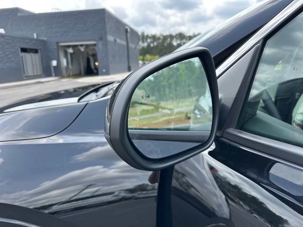 2024 Ebony Twilight Metallic Buick Encore GX Sport Touring FWD SUV