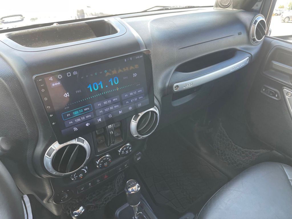2013 Jeep Wrangler Unlimited Sahara Blue at Emmons Autoplex
