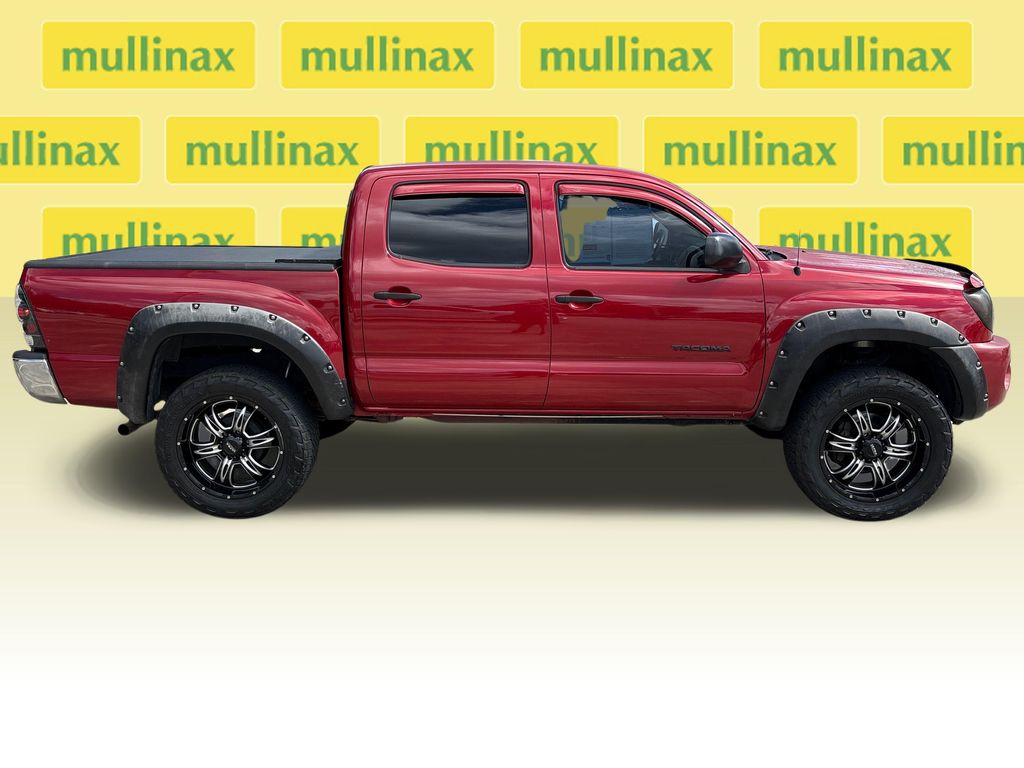Used 2011 Toyota Tacoma PreRunner with VIN 3TMJU4GN5BM123441 for sale in New Smyrna Beach, FL