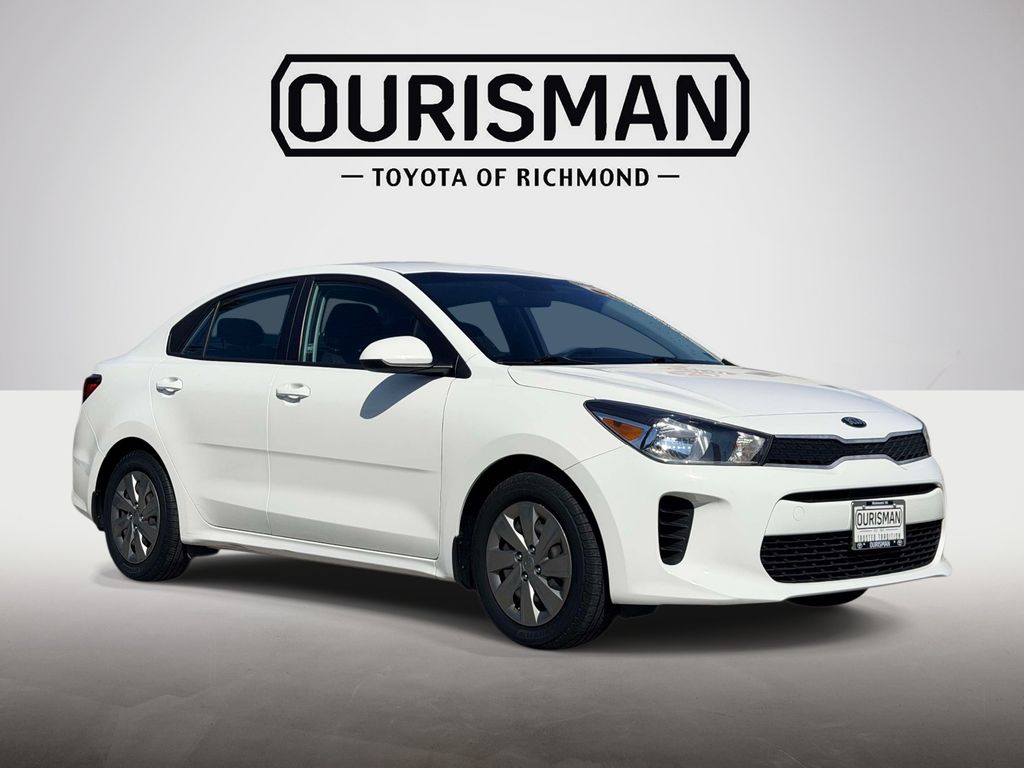Clear White 2020 Kia Rio Sedan Front-Wheel Drive Continuously Variable Transmission