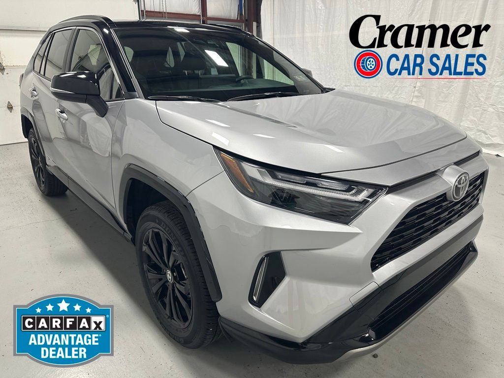 Silver Sky Metallic/Midnight Black Metallic 2025 Toyota RAV4 Hybrid SUV / Crossover All-Wheel Drive Continuously Variable Transmission