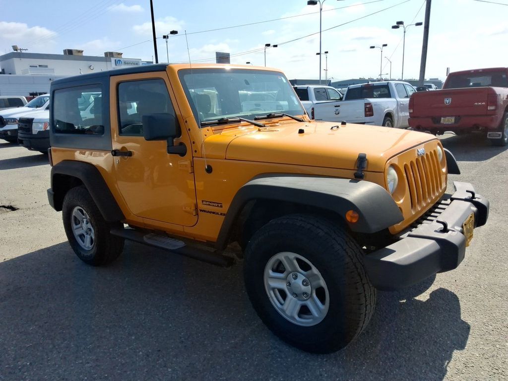 Used 2012 Jeep Wrangler Sport with VIN 1C4AJWAG9CL158789 for sale in Anchorage, AK