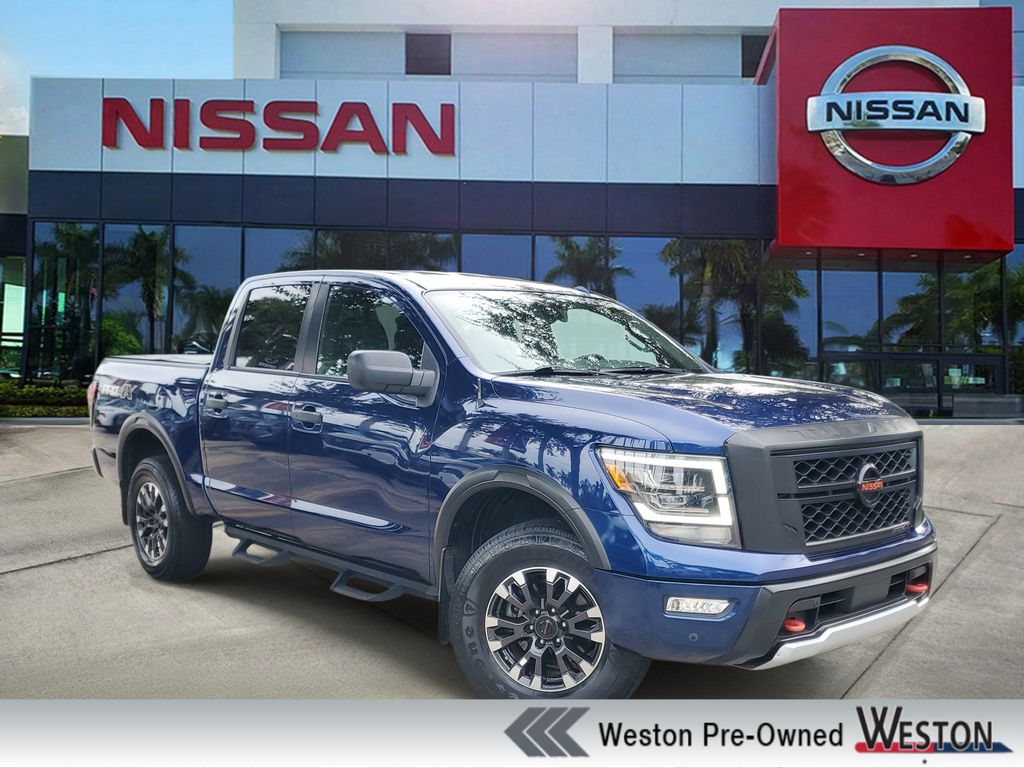 Deep Blue Pearl Metallic 2021 Nissan Titan Pickup Truck Four-Wheel Drive 9-Speed Automatic