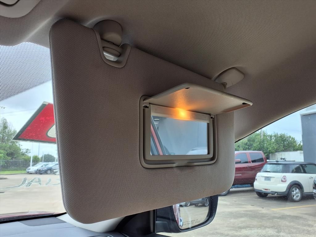 2016 Nissan Rogue SV Red at DeMontrond Gulf Freeway