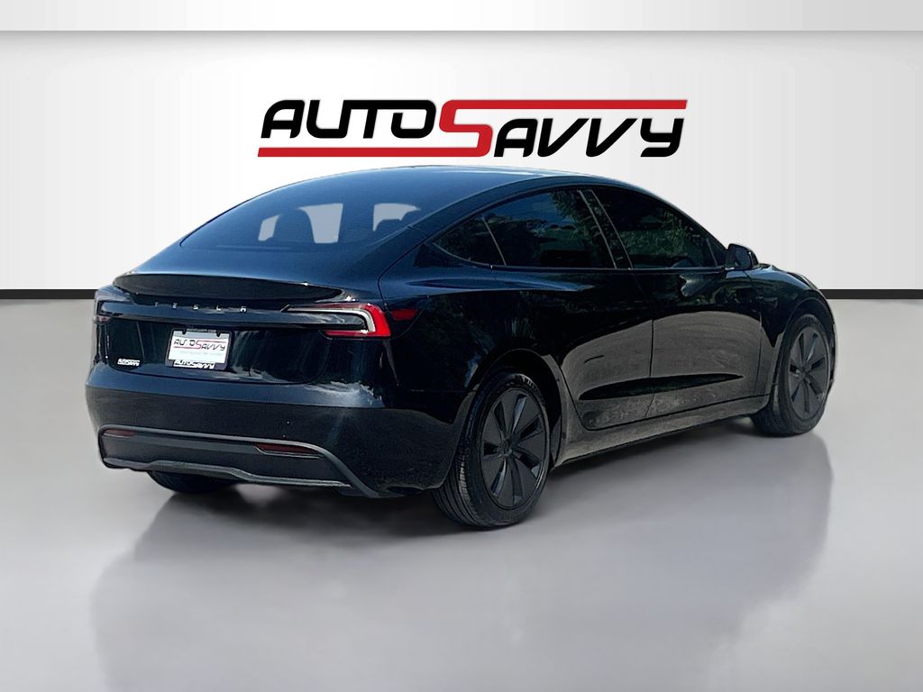 2025 Tesla Model 3 Long Range Black at AutoSavvy Houston Northwest