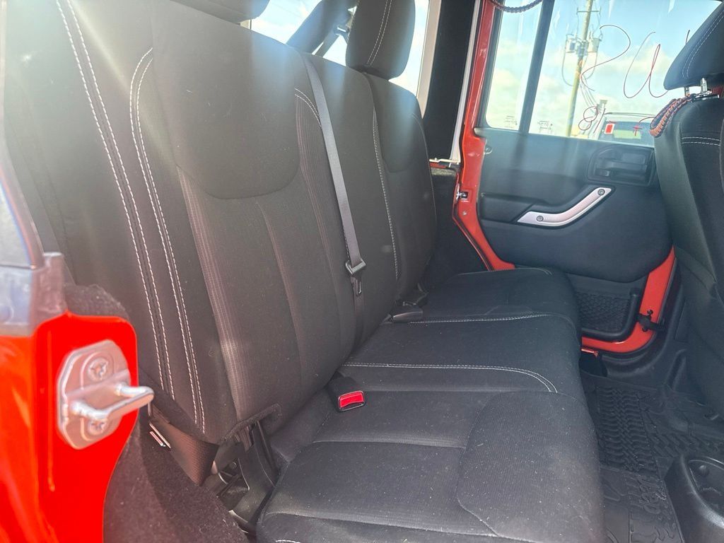 2015 Jeep Wrangler Unlimited Sahara Orange at Emmons Autoplex