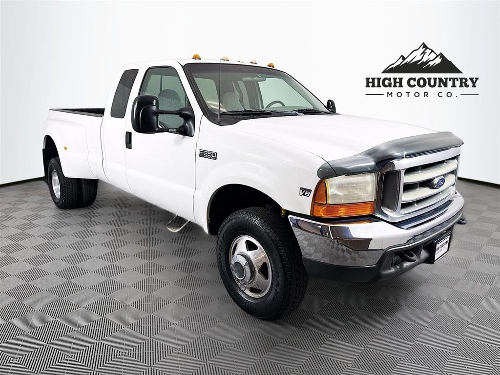 White 1999 Ford F-350 Super Duty Pickup Truck Four-Wheel Drive 6-Speed Manual Overdrive