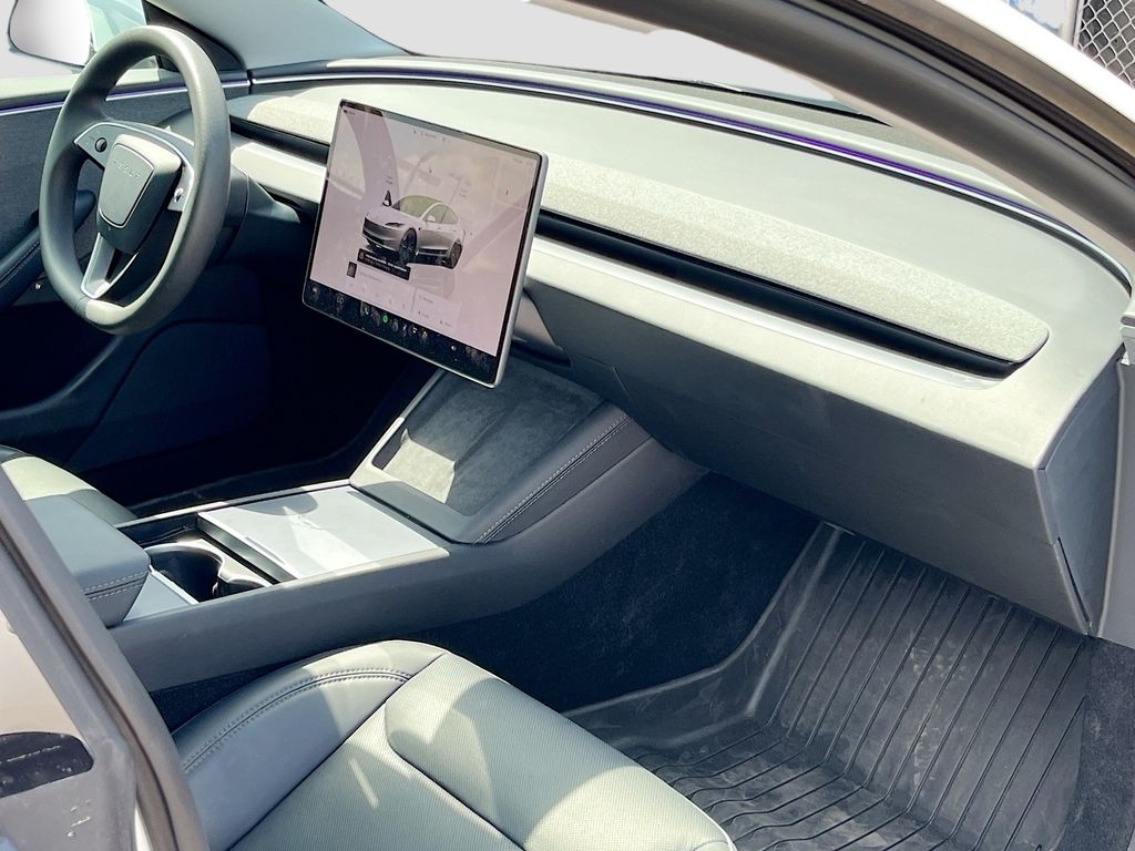 2025 Tesla Model 3 Long Range White at AutoSavvy Houston Northwest