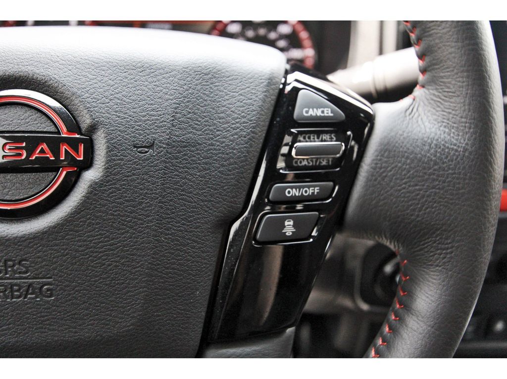 2025 Nissan Frontier PRO-4X Red at Bravo Nissan